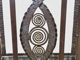 a metal gate that has a design on it