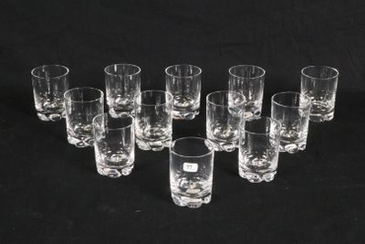 a lot of glasses that are sitting on a table