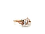 a close up of a ring on a white surface with a white background