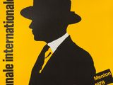 a yellow poster with a silhouette of a man in a hat