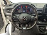 the interior of a car with a steering wheel and dashboard controls
