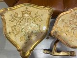 two chairs that are sitting next to each other on a table