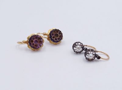two pairs of gold and amethorate earrings on a white surface