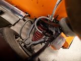 a close up view of a vehicle ' s front suspension