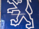 a blue and white sign with a lion on it