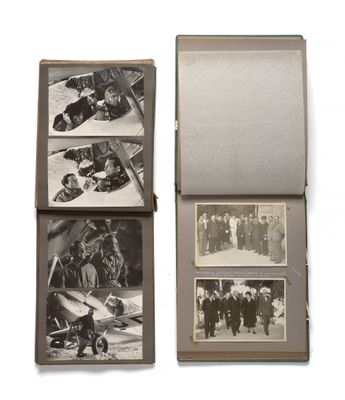 an old black and white photo of a group of people on a motorcycle