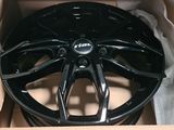 a box with some black rims in it