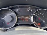 a close up of a car dashboard with various gauges