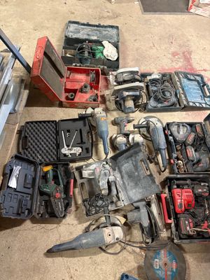 a lot of tools that are sitting on the floor