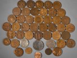 a lot of coins that are sitting on a table