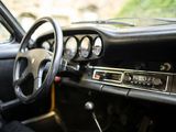 a car dashboard with a steering wheel and a dash board