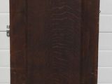 an old wooden grandfather clock sitting in a room