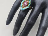 an image of a woman ' s hand with a ring on it ' s finger
