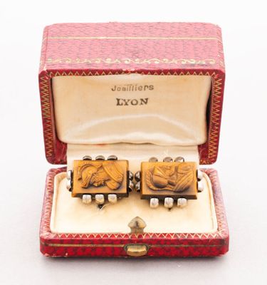 an image of a pair of cuff rings in a red box