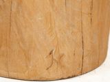 a close up of a wooden bowl on a table