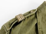 an image of a close up of a green jacket