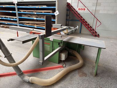 a machine that has a hose attached to it ' s side