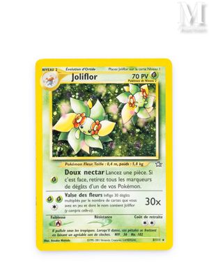 a close up of a pokemon card on a white surface