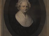 an old black and white portrait of a woman in a black dress