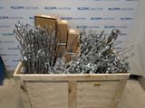 a wooden box with a bunch of metal items inside of it