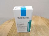 a box of la roche - posay effaclar cleanser on a wooden table