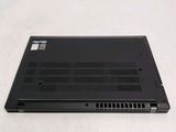 a black laptop that is sitting on a white surface