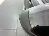 a reflection of a car in the side mirror of a car