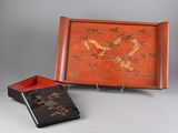 pair of asian lac lac lac lac trays with dragon design
