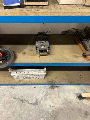 a picture of a work bench with a lot of tools on it