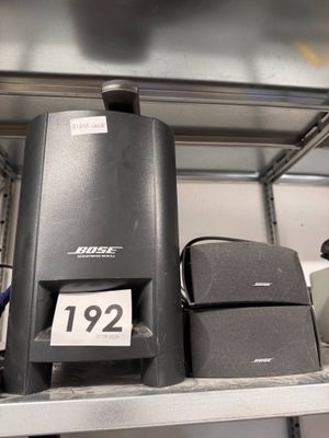 many different speakers on a shelf in a store