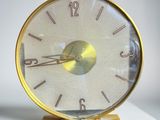 a clock that is sitting on top of a table