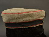 an image of a military hat with a red line on it