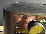 a close up of a toaster on a table