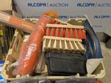 a pile of assorted items sitting in a box