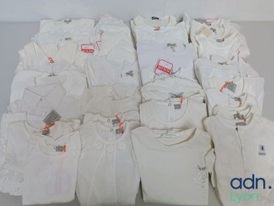 a lot of t - shirts that are stacked on top of each other