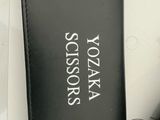 black leather case for a cell phone with the name of the company on it
