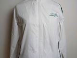 the jacket is white and has a green logo on it