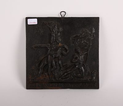 une plaque ancienne en fonte représentant une scène mettant en scène un homme et une femme