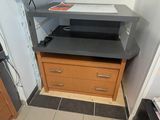 an image of a small room with a printer and a cabinet