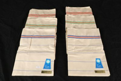 these are two pairs of pants that are lined up on a black background