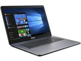 the asus laptop is open on a white surface with windows on the screen