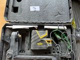 an open case with tools in it sitting on a table