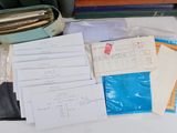 a lot of papers that are sitting on a table