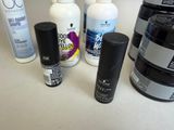 many different types of hair care products on the counter