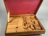 an image of a wooden box filled with lots of pieces of wood