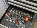 many tools in the drawer of a tool box