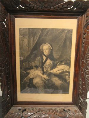 tableau représentant une femme assise dans un lit avec un chat