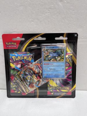 a close up of a package of pokemon cards on a white surface
