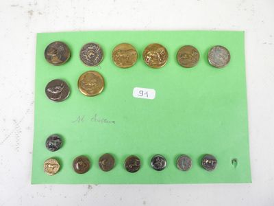 a lot of coins that are on a green surface