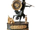 statue of a woman holding a clock and a sword on a table